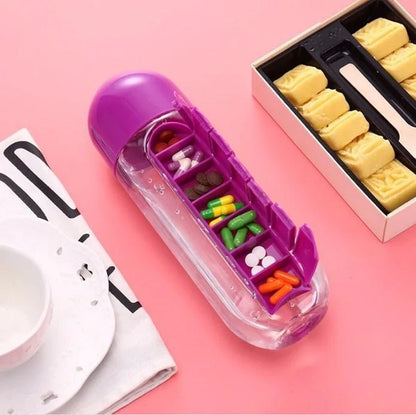 Water bottle with pill box